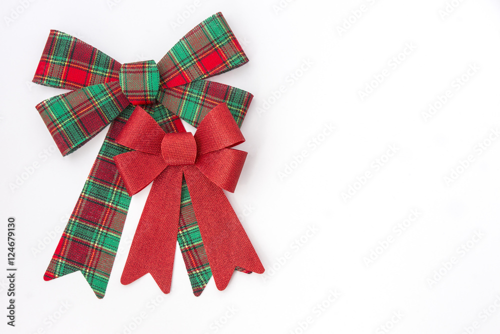Large red and green plaid bow with smaller red holiday bow Large red and green plaid bow with smaller red holiday bow