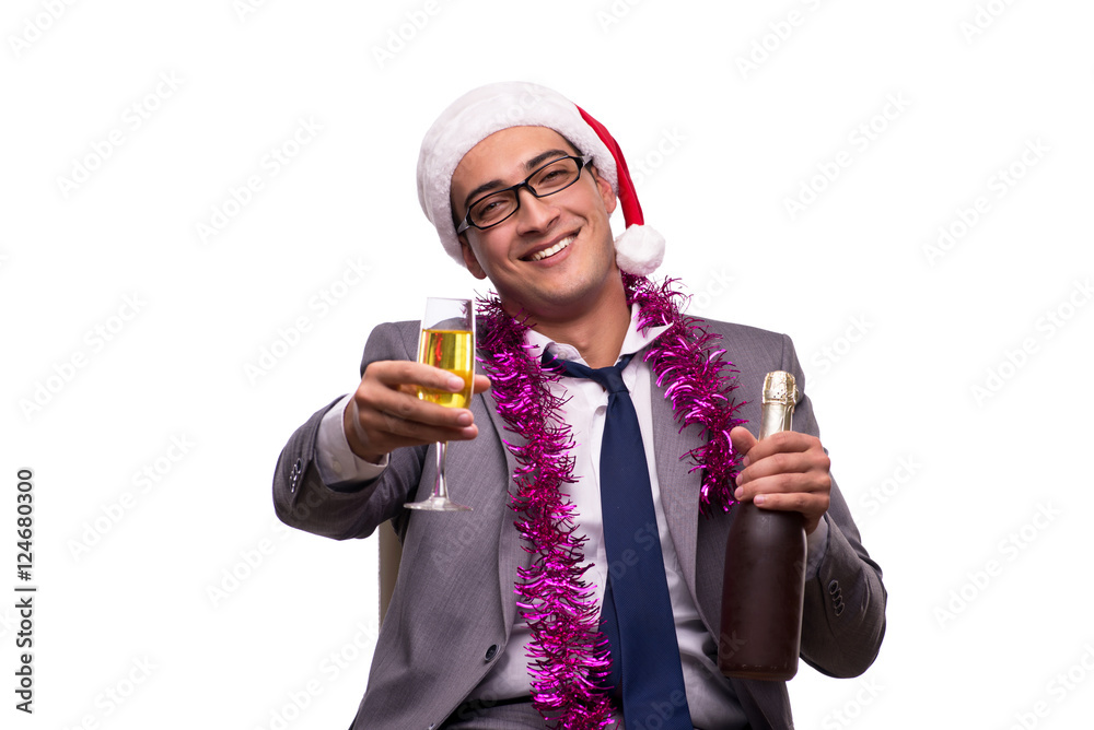 Young businessman celebrating christmas in office Young businessman celebrating christmas in office
