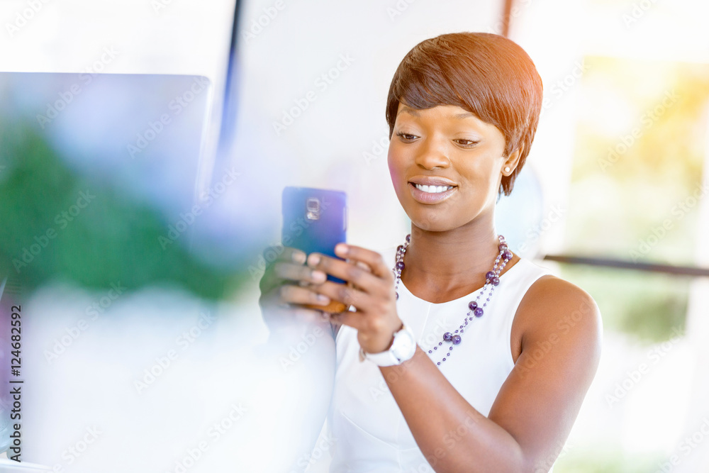 Portrait of smiling business woman with mobile Portrait of smiling business woman with mobile