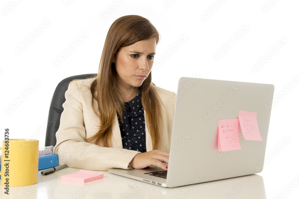 attractive businesswoman on her 30s sitting at office chair working at laptop attractive businesswoman on her 30s sitting at office chair working at laptop