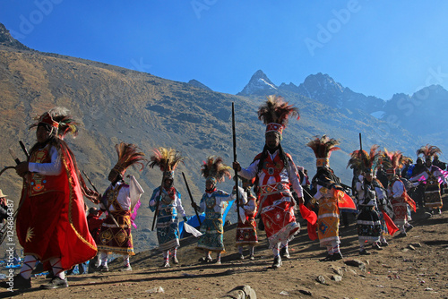Parade at Quyllurit'i inca festival in the peruvian andes near ausangate mountain, one of the oldest, nicest and most traditional religious ceremonies in the world