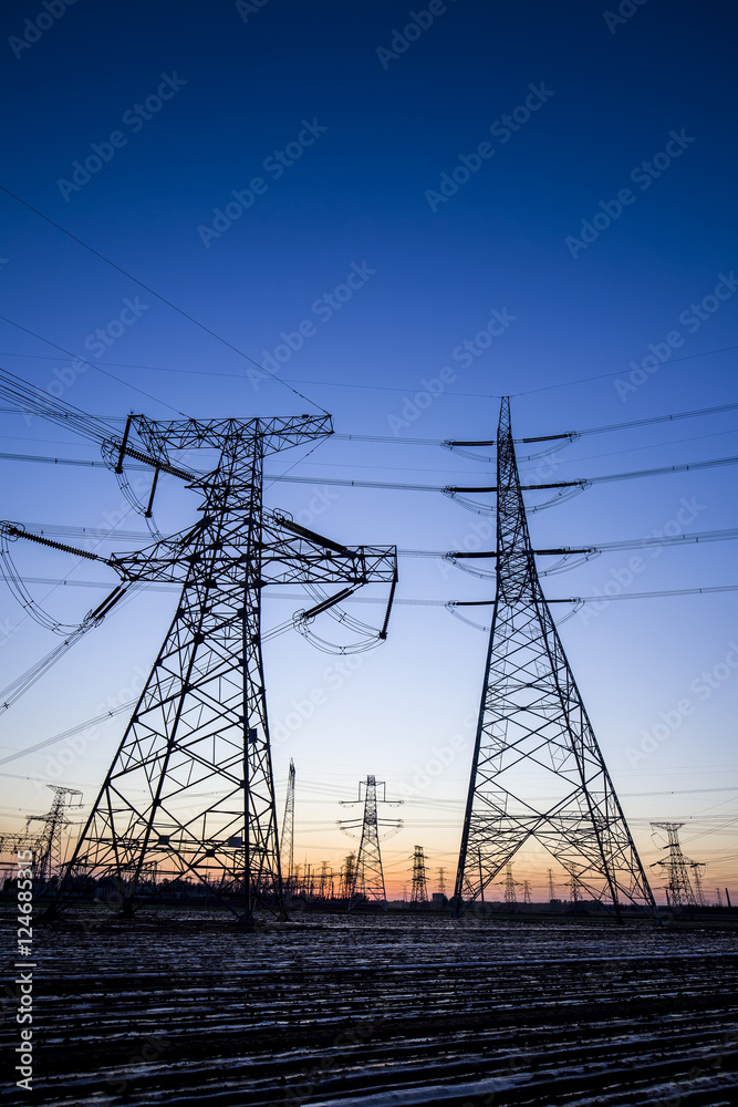 The silhouette of the evening electricity transmission pylon The silhouette of the evening electricity transmission pylon