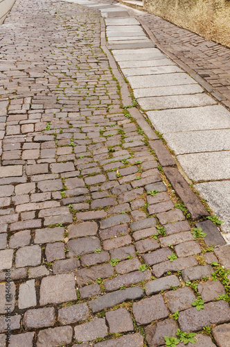 Small alley with paving stones