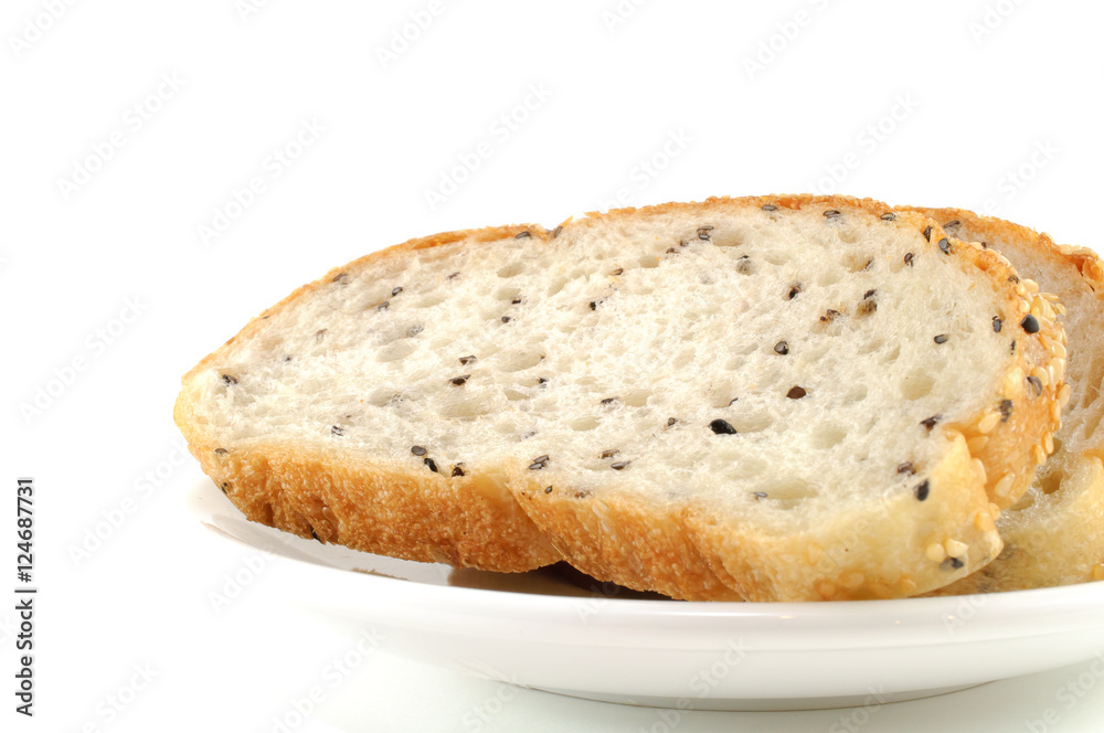 Sliced Sesame Bread On White Background Sliced Sesame Bread On White Background