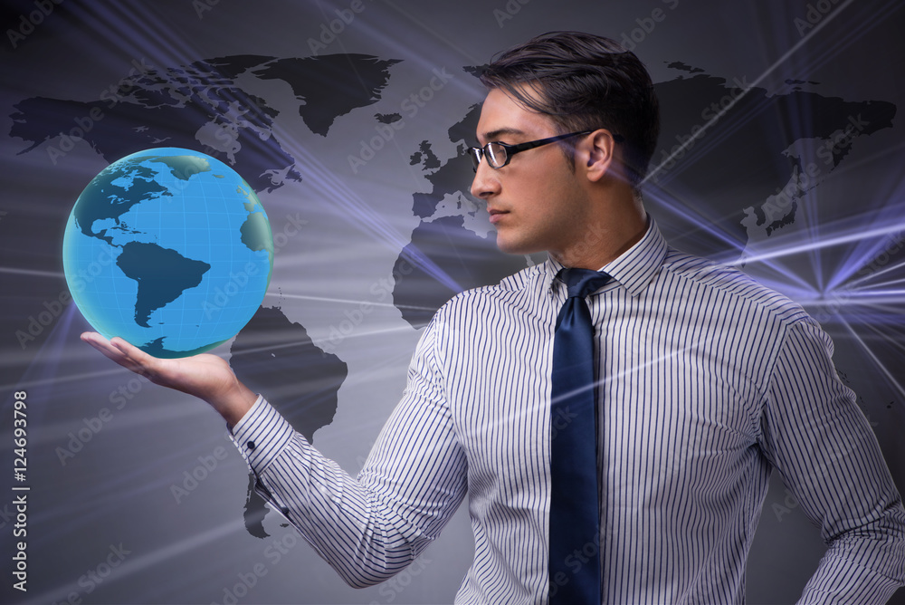 Businessman holding globe in global business concept Businessman holding globe in global business concept