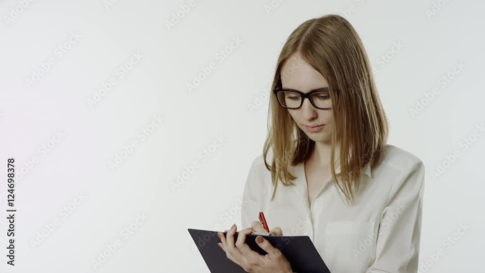 Business woman working whith clipboard Business woman working whith clipboard