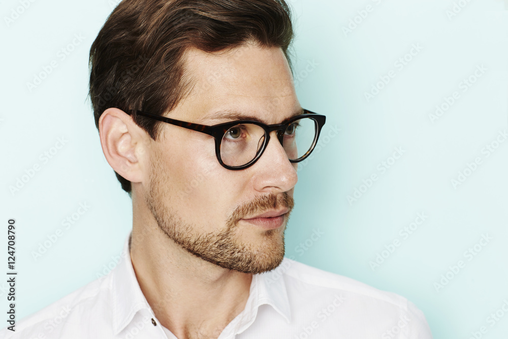 Man in spectacles, studio shot Man in spectacles, studio shot