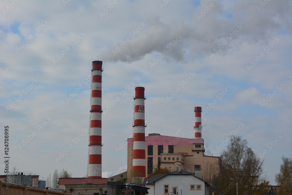 Pipe thermal power plant on a background of blue sky, industry