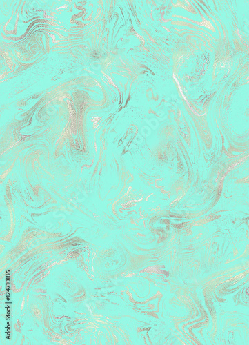 Creative hand made gilded,marble texture on the mint blue backgr