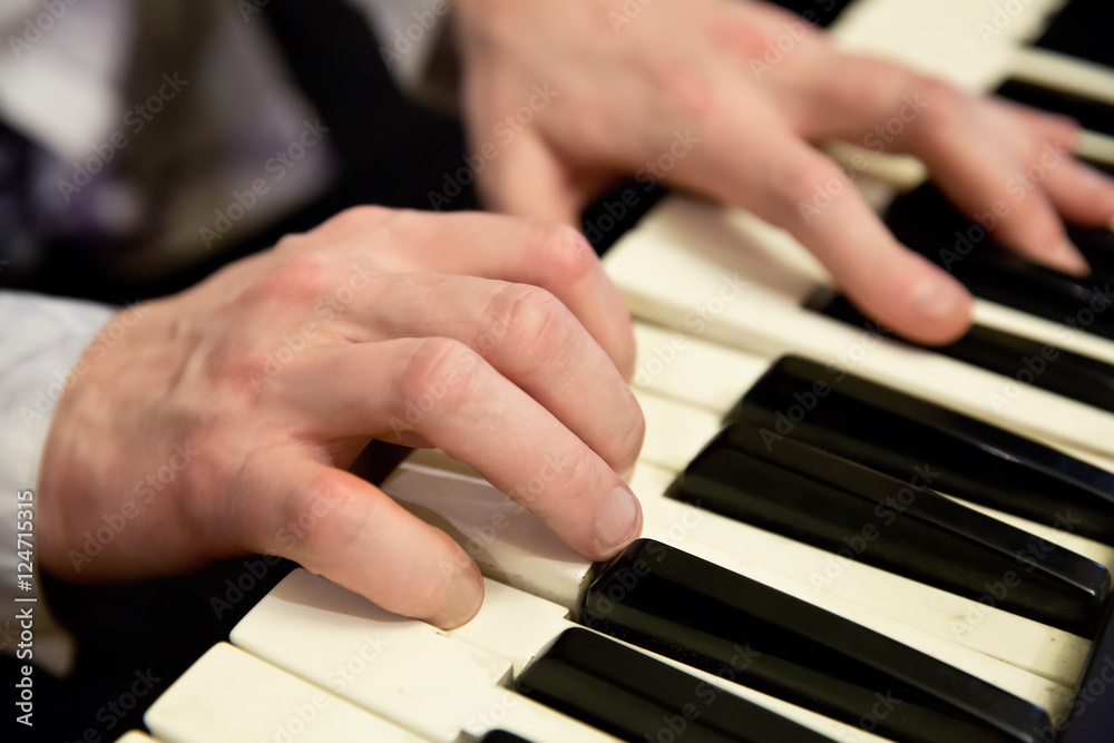 pianists hands and piano keyboard pianists hands and piano keyboard