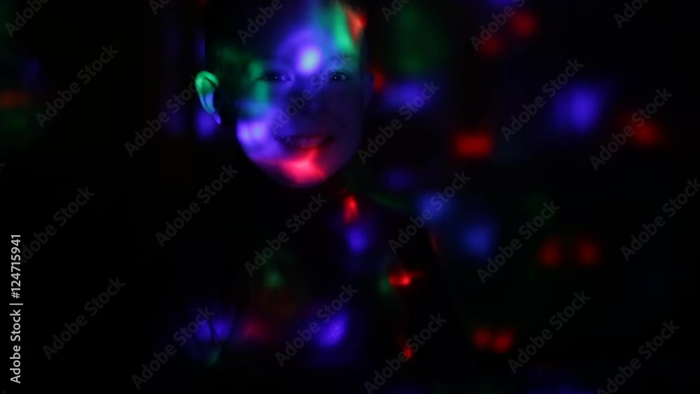 Disco light lamp on a little boy Disco light lamp on a little boy