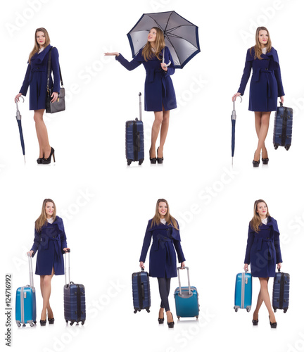 Woman with suitcase and umbrella isolated on white © Elnur