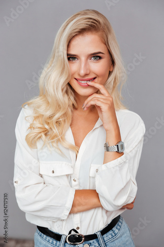 Close up portrait of beautiful wondered woman looking at camera