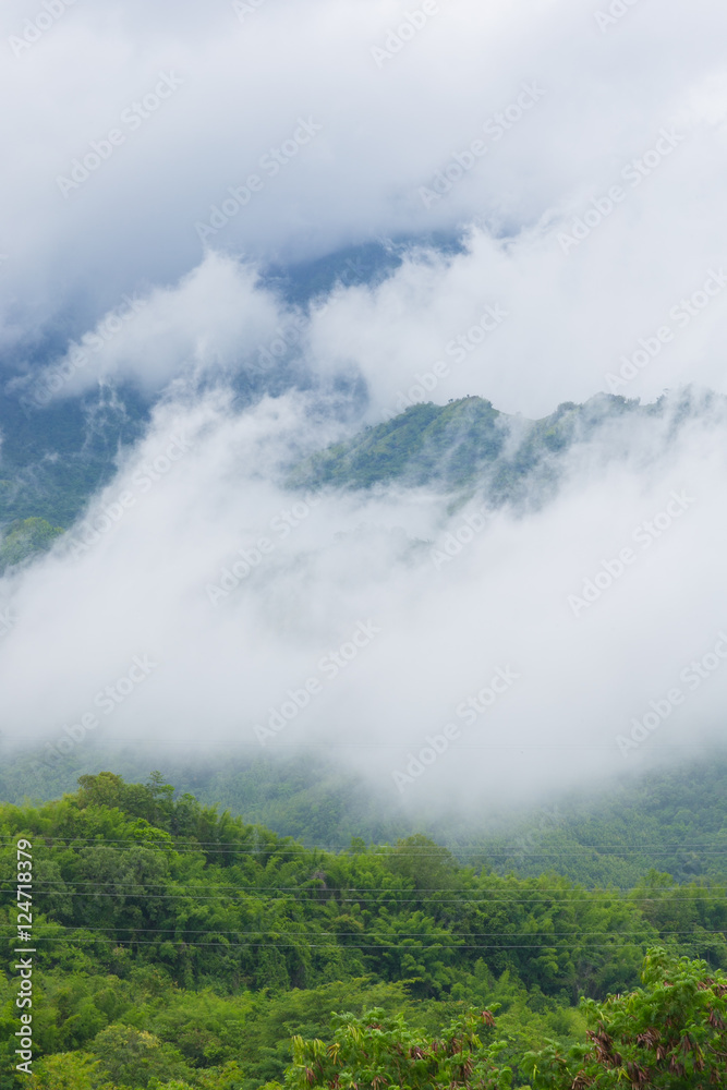 Clouds are rolling through after the rain in the Great Smoky Mountains Khao Kho in Thailand 
