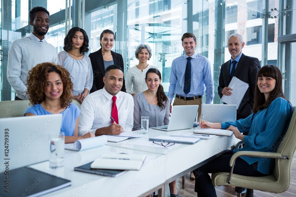 Smiling business people in office