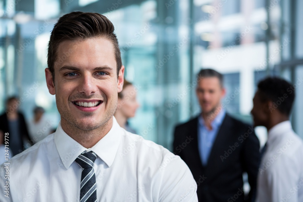 Smiling businessman in office Smiling businessman in office