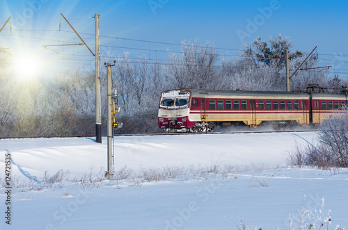 soviet electric train traveling winter sunny day