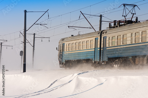 soviet electric train traveling winter sunny day