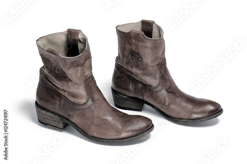 Pair of traditional cowboy boots retro tone