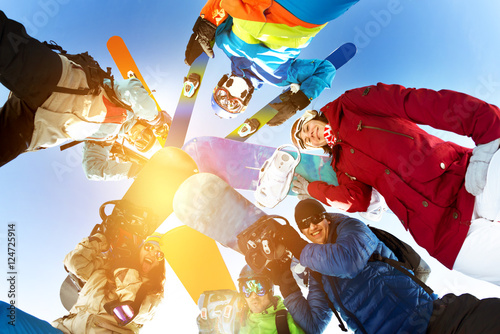 Group friends snowboarders skiers snowboarding skiing