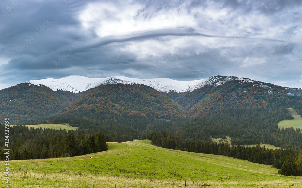 Mountains range and storm clouds Mountains range and storm clouds