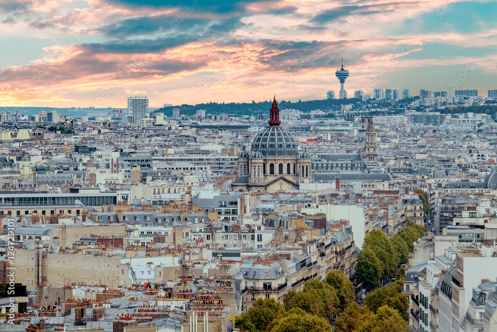 Aerial view of Paris, France. Sunset, buildings and warm light. Shot in october daylight.