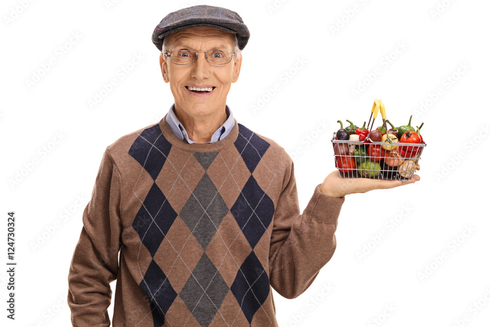 Happy senior holding a small shopping basket Happy senior holding a small shopping basket