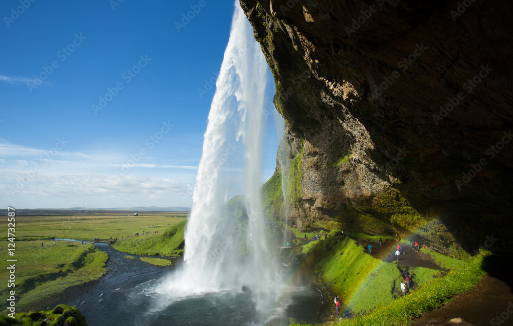 Fototapeta premium Waterfall Seljalandsfoss with rainbow in Iceland.