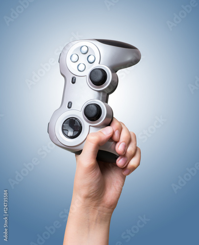 Game controller in hand raised up