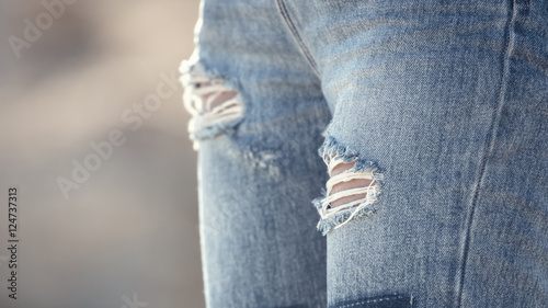 holes in jeans photo