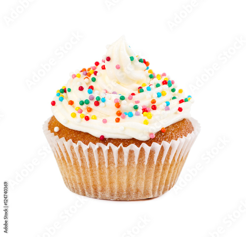 Cupcake with cream, decorated colorful candy sprinkles