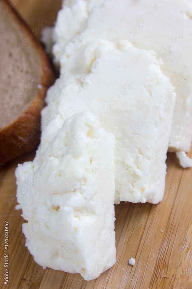 Traditional indian cheese panneer with pieces of bread Traditional indian cheese panneer with pieces of bread