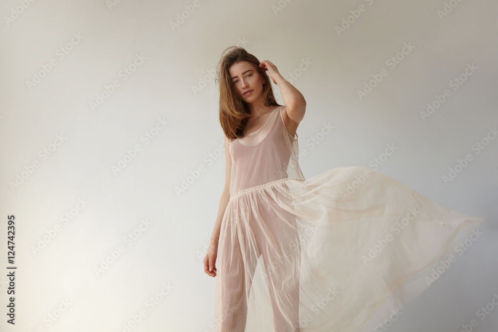 woman's portrait with transparent flying dress of ballerins woman's portrait with transparent flying dress of ballerins