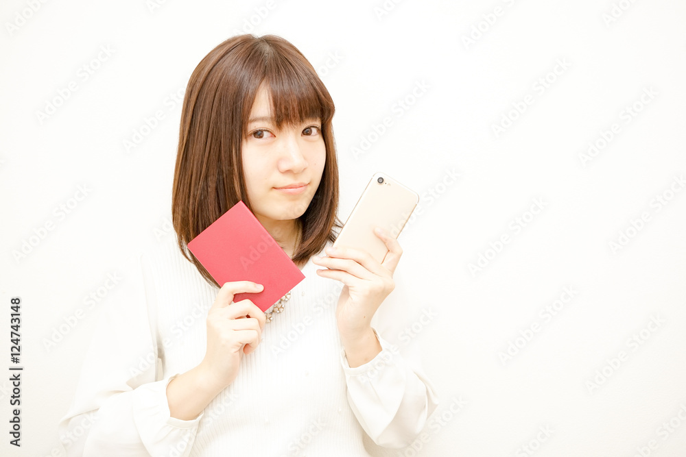 Young woman holding her passport with smile Young woman holding her passport with smile