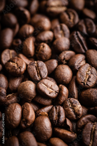 roasted coffee beans on dark background, can be used as a background