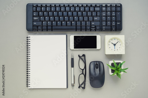 Top view of office desk technology items