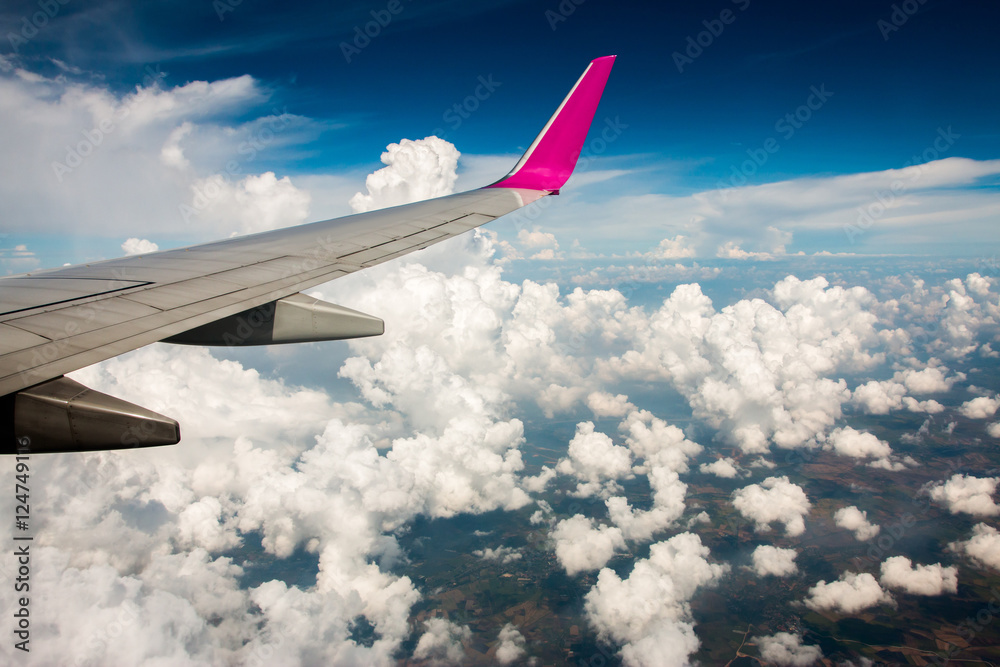 Fototapeta premium iew from airplane window to see sky on evening time.