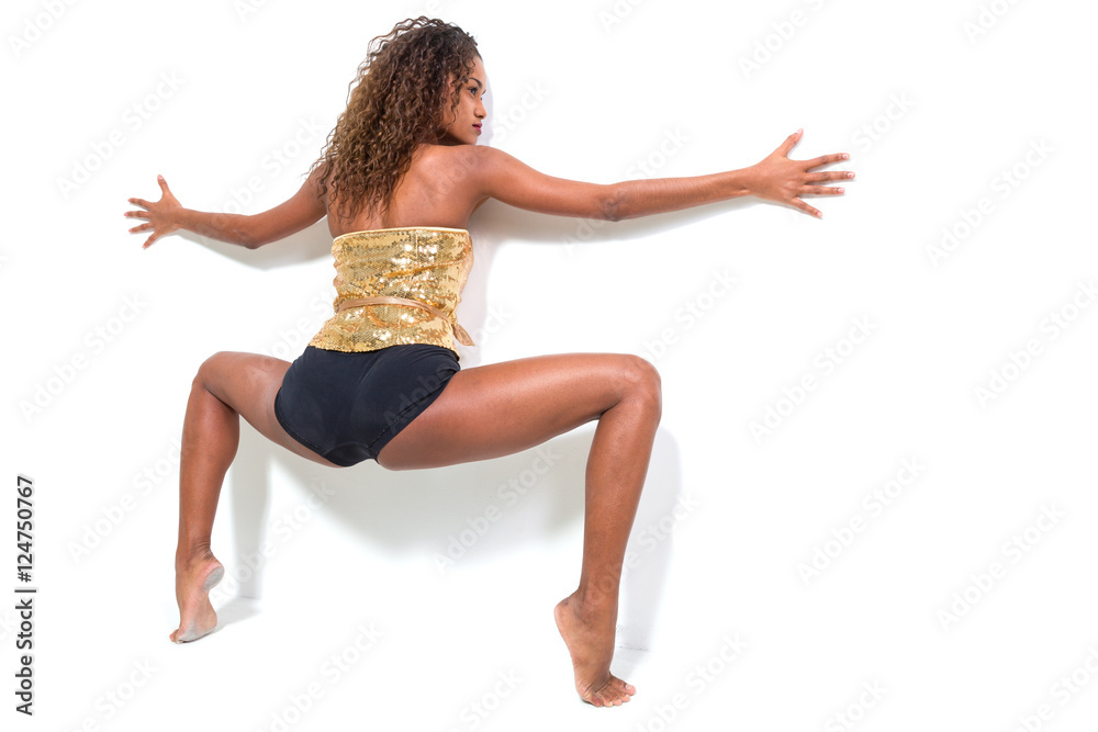 Girl leaning against the wall in difficult position