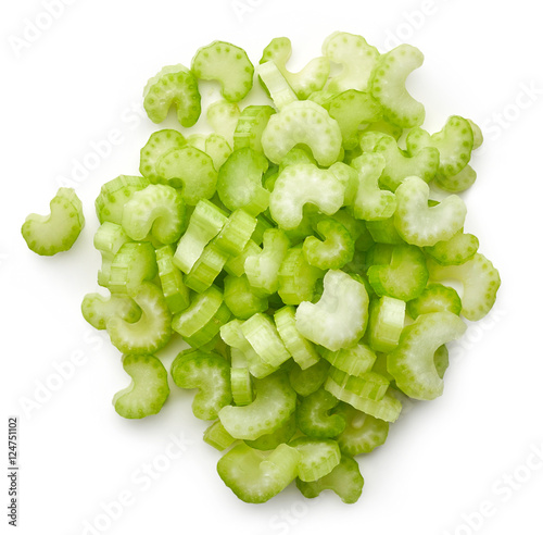 Chopped celery isolated on white, from above