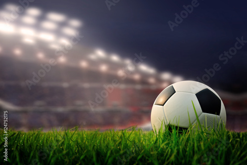 soccer field and stadium with fans the night before the match, s