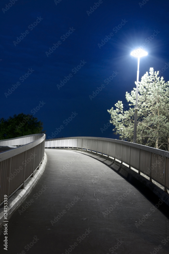 curved pavement at night