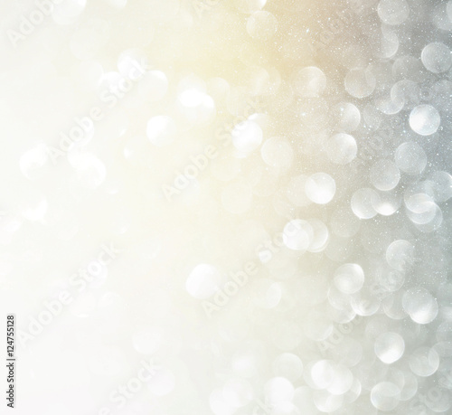 glitter vintage lights background. silver and white