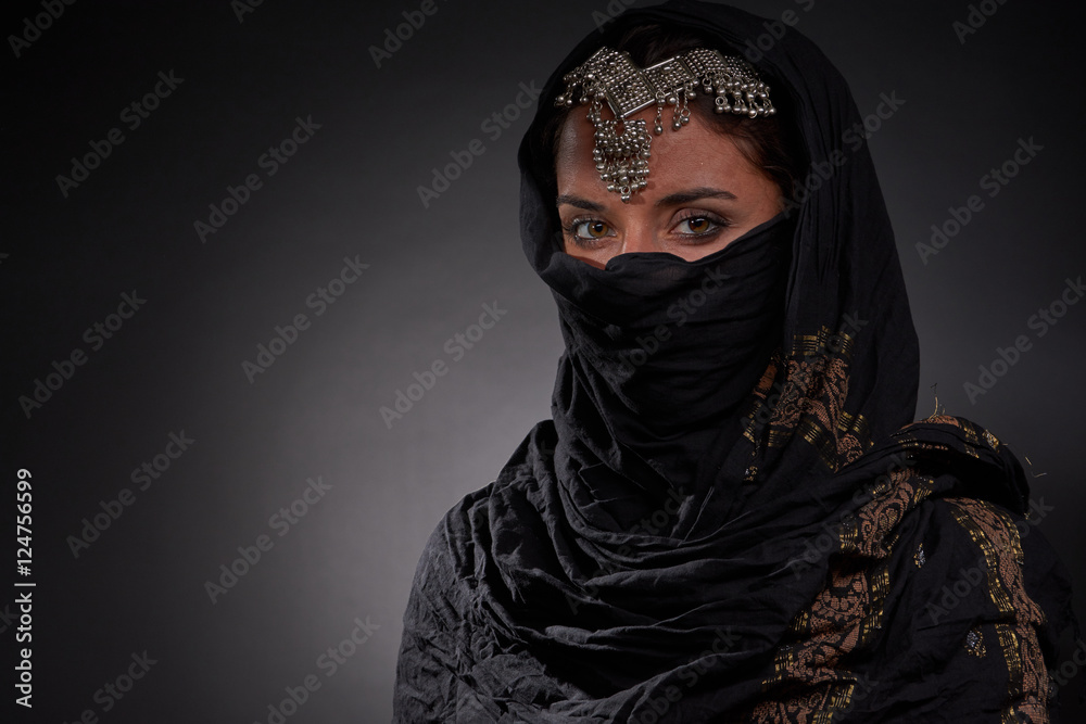 portrait of a beautiful Arab girl for advertising and magazines. Photos in the style of noir portrait of a beautiful Arab girl for advertising and magazines. Photos in the style of noir