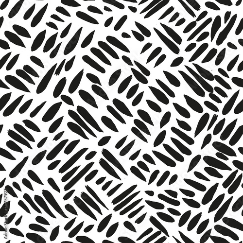 Specks seamless pattern.Traditional ethnic pattern. Brushwork by hand. Black and white vector image.template for printing on fabric seamless surfaces and wrapping paper.