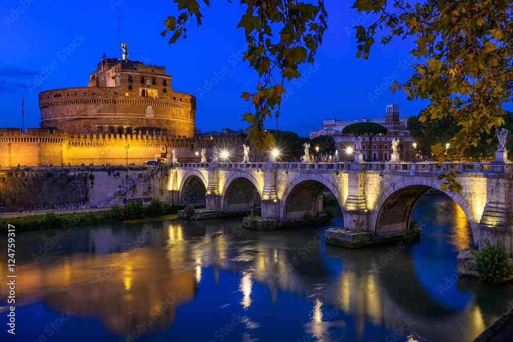 Night view of Castle Sant Angelo (Mausoleum of Hadrian), bridge Sant Angelo and river Tiber in Roma. Italy