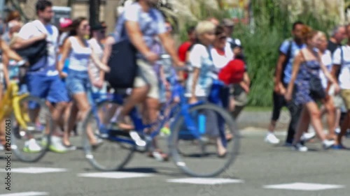 Wallpaper Mural Three quarter view,  pedestrians blurred crossing a street in the city of Barcelona in summer. Torontodigital.ca