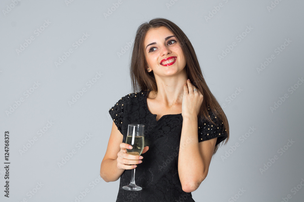 girl in black dress posing in studio girl in black dress posing in studio
