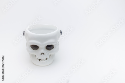 Skull toy for halloween decorations on white background.
