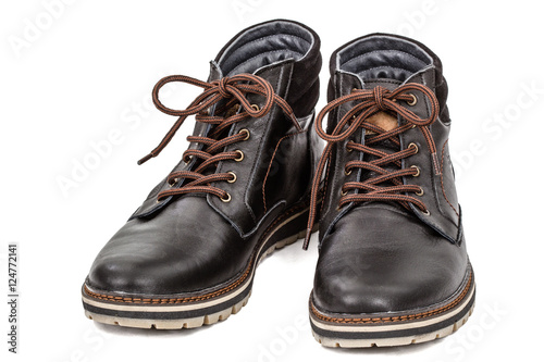 Pair of new boots, isolated on white background