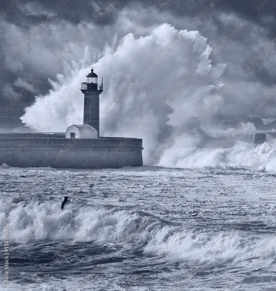 ten meters waves over the lighthouse blue filter